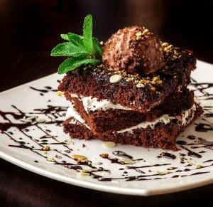 Chocolate brownie cake with a scoop of ice cream